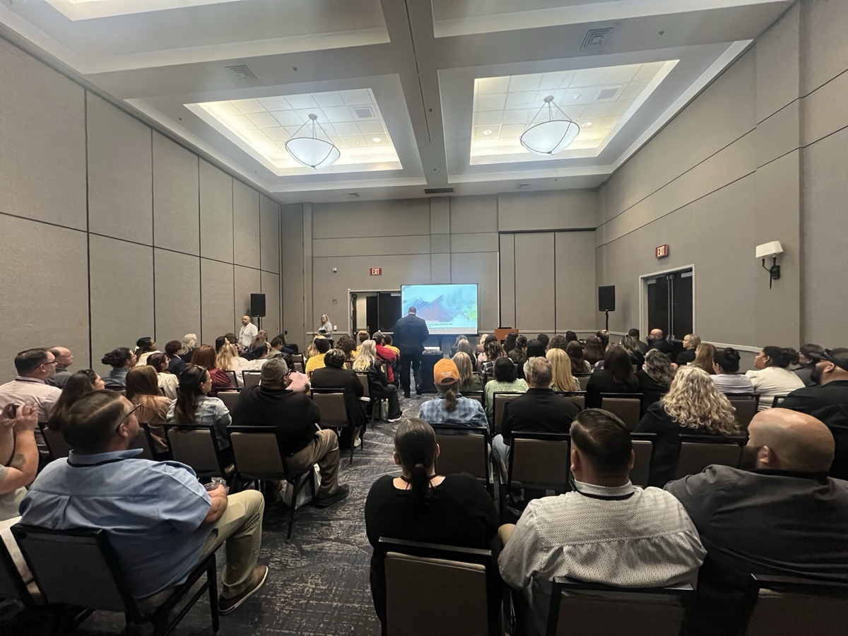 A packed room during a DyeNamics awareness session